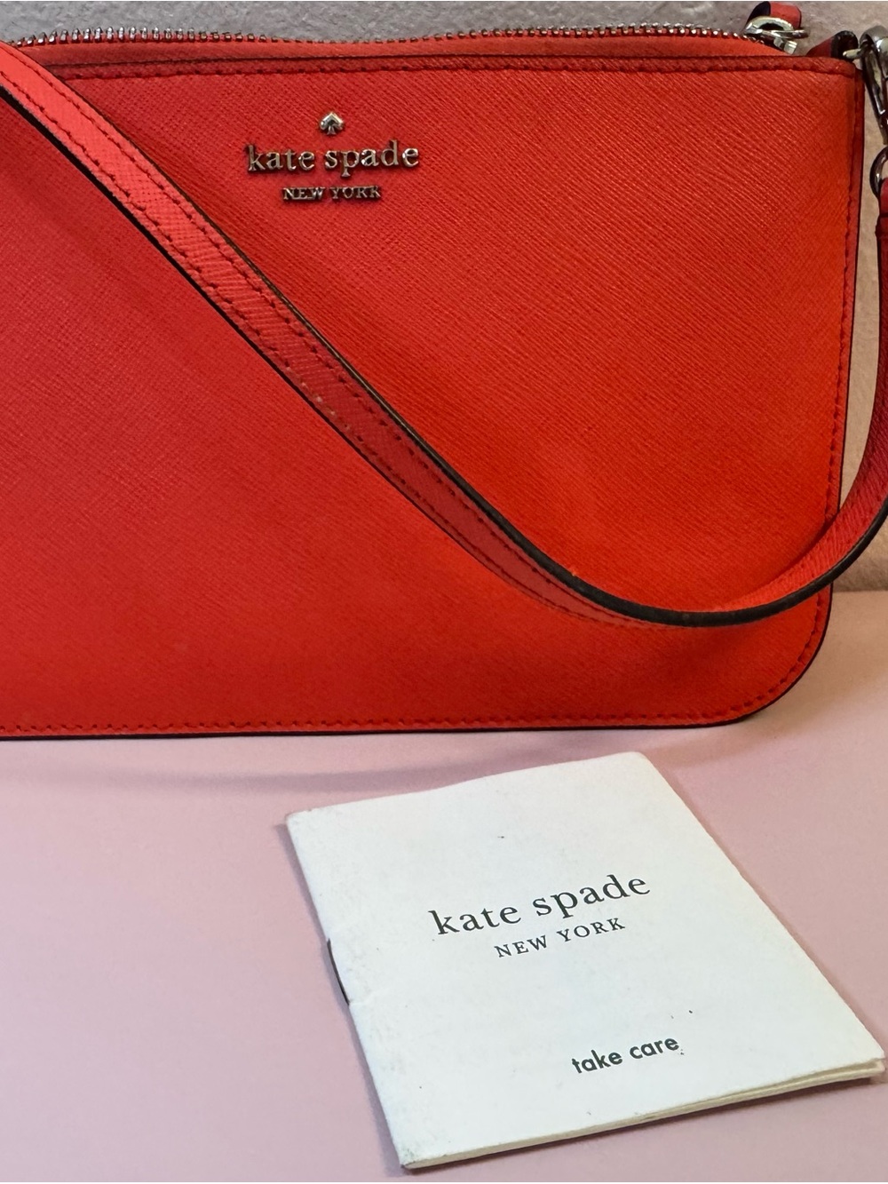 kate spade red crossbody wristlet with thin strap